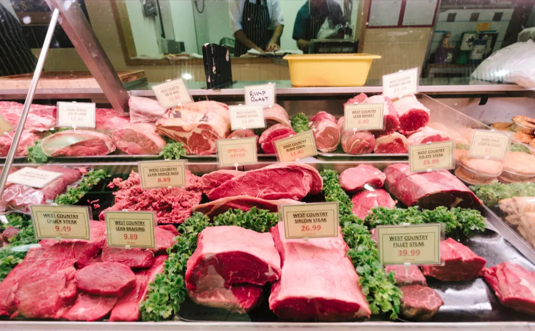 The butchery display counter with labelled cuts of beef