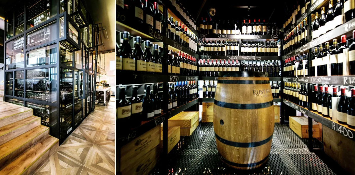 The walk-in wine cellar with a barrel at its centre